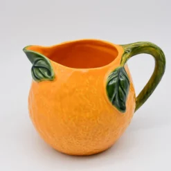 Carafe en céramique en forme d'orange