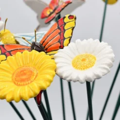 Fleurs et papillons artificiels en céramique