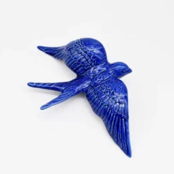 Hirondelle de Caldas da Rainha en céramique bleue