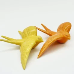 Hirondelle de Caldas da Rainha en céramique orange