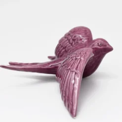 Hirondelle de Caldas da Rainha en céramique mauve