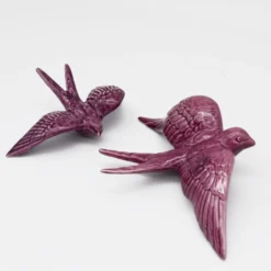 Hirondelle de Caldas da Rainha en céramique mauve