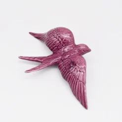Hirondelle de Caldas da Rainha en céramique mauve