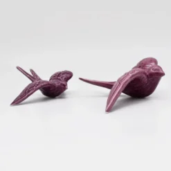 Hirondelle de Caldas da Rainha en céramique mauve