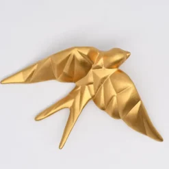 Hirondelle stylisée en céramique - Doré