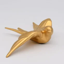 Hirondelle stylisée en céramique - Doré