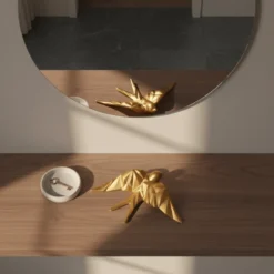 Hirondelle stylisée en céramique - Doré