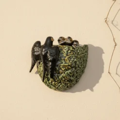 Nid d'hirondelle en céramique vert